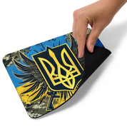 Ukrainian military mousepad featuring camouflage, Tryzub emblem, and flag, with non-slip base for gaming and desk use.