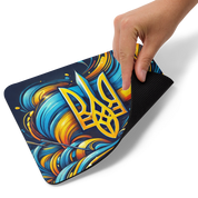 Ukrainian Tryzub mousepad with abstract blue and yellow swirl design, featuring non-slip rubber base for stability and smooth surface.