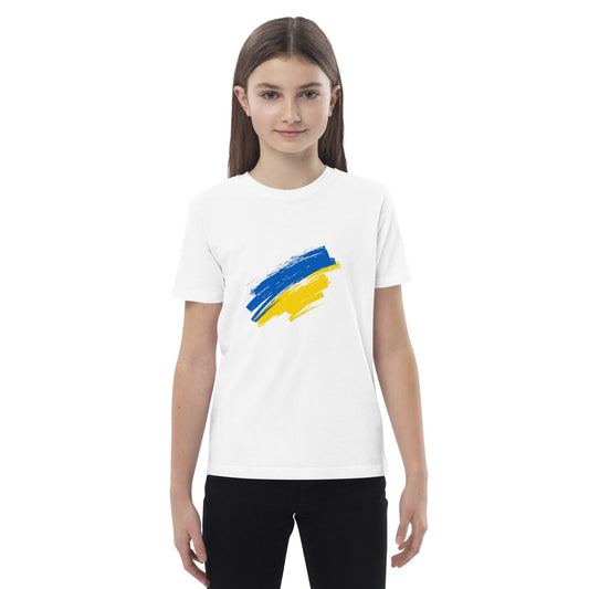 Kid wearing organic cotton t-shirt with Ukrainian flag design, showcasing sustainable fashion and Ukrainian pride.