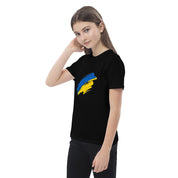 Young girl wearing organic cotton kids' t-shirt with Ukrainian flag design.