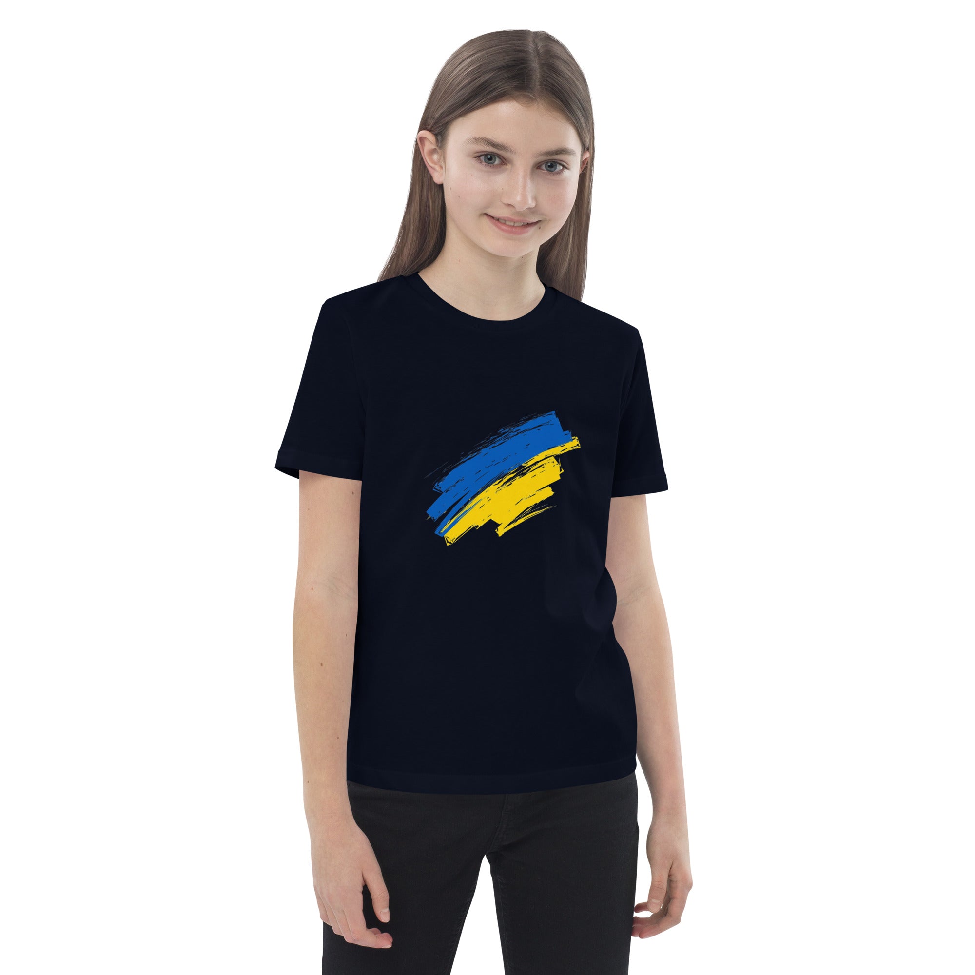 Girl wearing organic cotton kids t-shirt with Ukrainian flag design, sustainable and patriotic clothing for children.