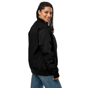 Model wearing Ukrainian Premium Recycled Bomber Jacket, eco-friendly fashion from the Vibe Trizub Collection in black, side view.