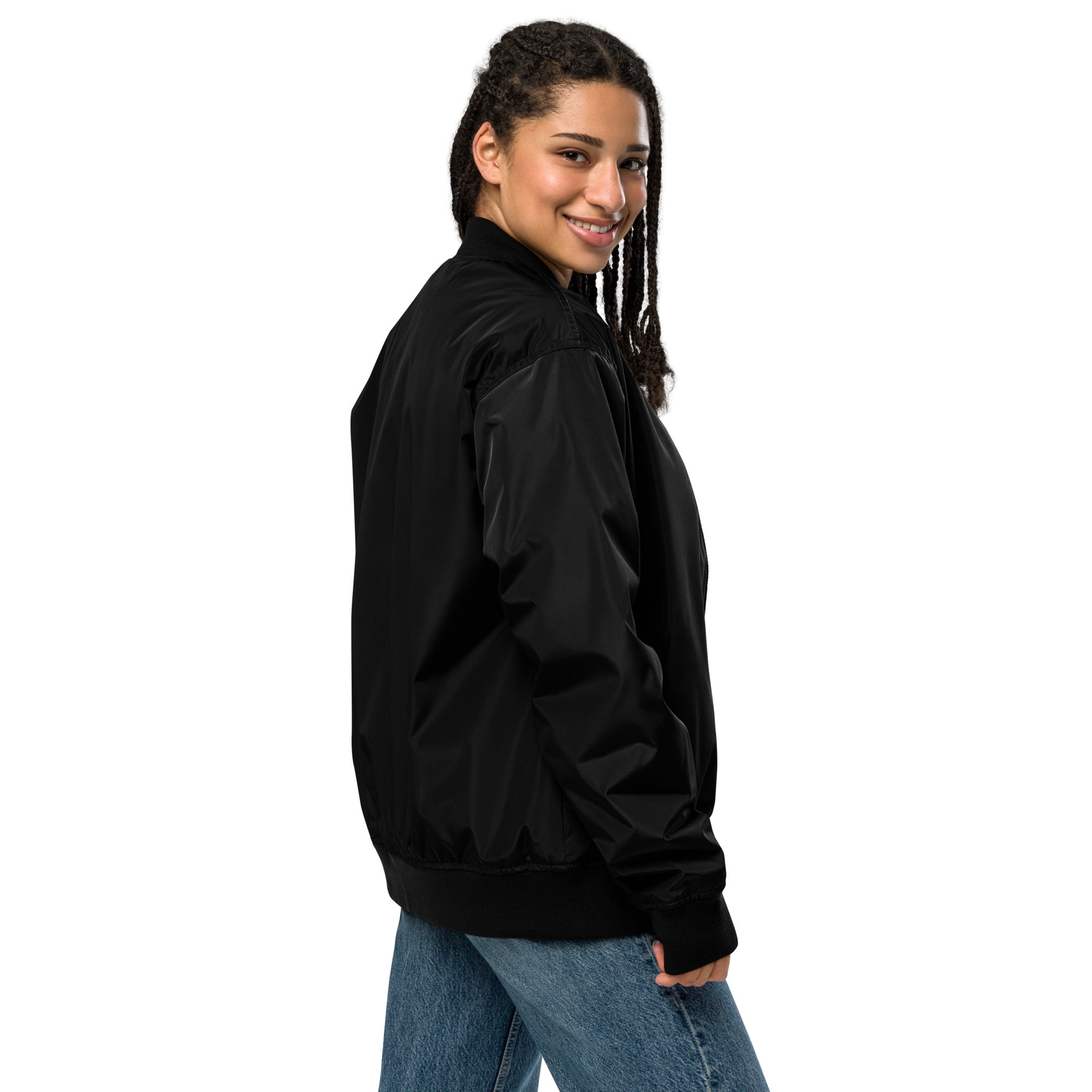 Model wearing Ukrainian Premium Recycled Bomber Jacket, eco-friendly fashion from the Vibe Trizub Collection in black, side view.
