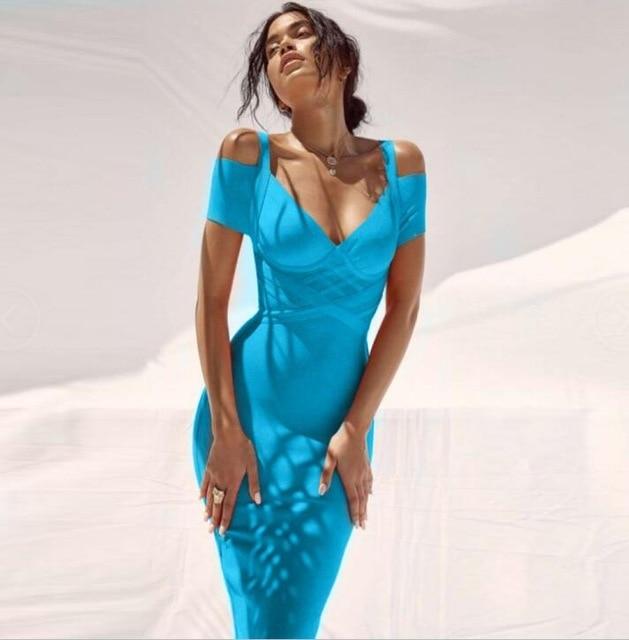 Nysara Off-Shoulder Bandage Dress in blue, featuring a plunging V-neck and sleek lines, perfect for cocktail events.