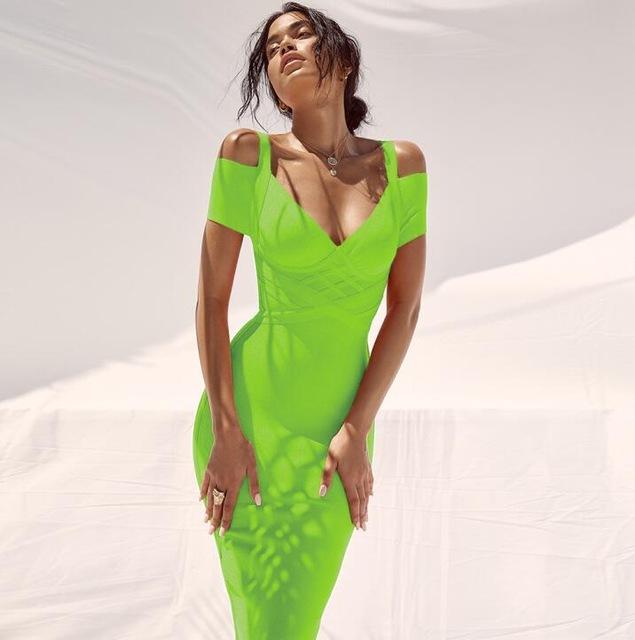 Woman wearing Nysara Off-Shoulder Bandage Dress in vibrant green, showcasing elegant V-neck and sleek fit.