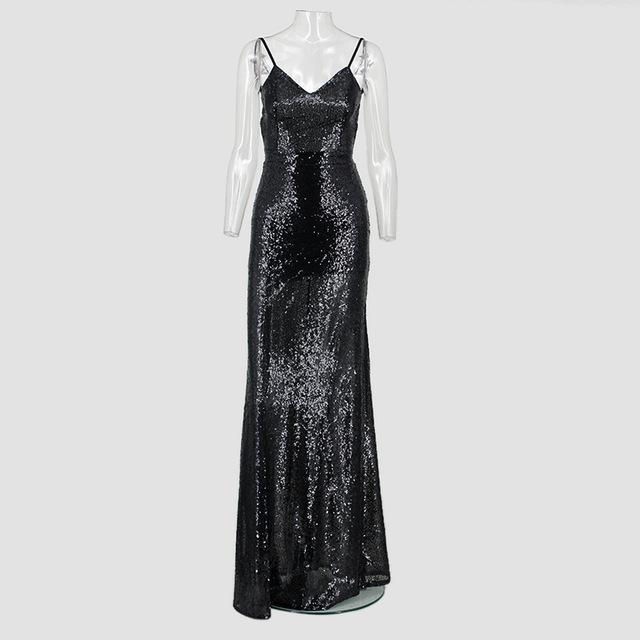 Elegant black sequin evening gown with spaghetti straps and a floor-length fit, perfect for formal events or special occasions.