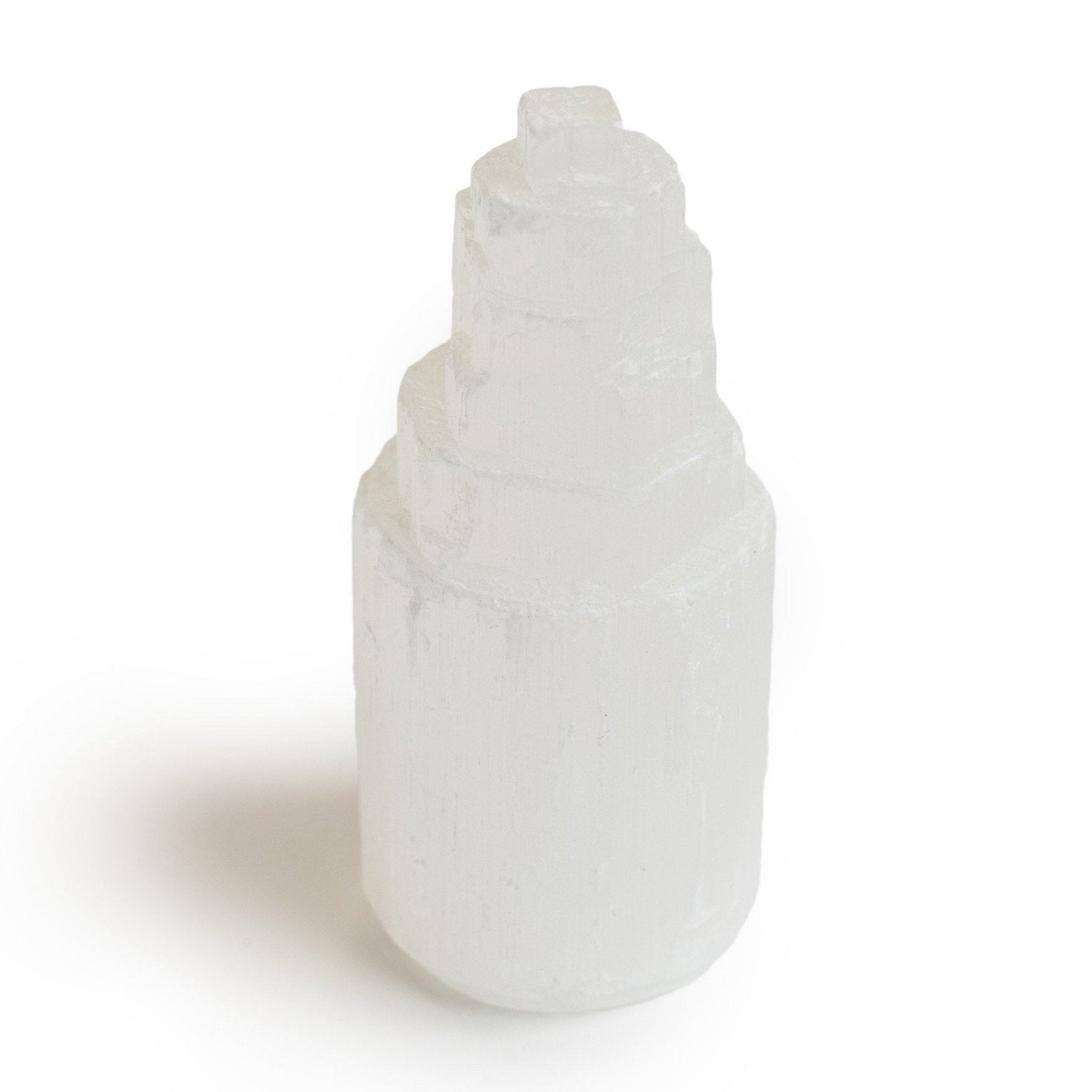 Lunethera Cleansing Tower, a hand-carved selenite crystal for energy purification, stands 4 inches tall with a translucent finish.