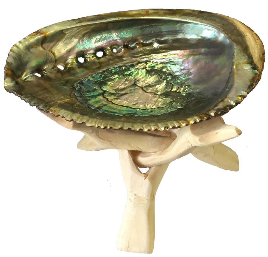 Solhara Folding Tripod Stand holding an abalone shell, hand-carved from wood, ideal for spiritual rituals and home displays.