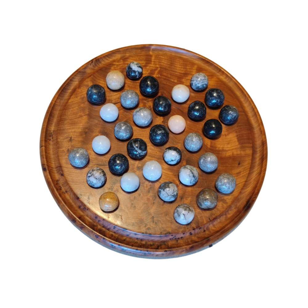 Thurell Handmade Thuya Wood Solitaire Set with stone marbles, showcasing elegant Moroccan craftsmanship and rich wood grain texture.