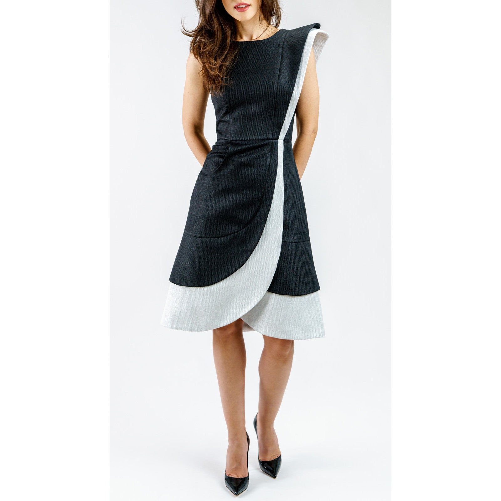Woman wearing Arlessa Sculpted Asymmetric Dress with single-shoulder silhouette in black and white French jacquard.