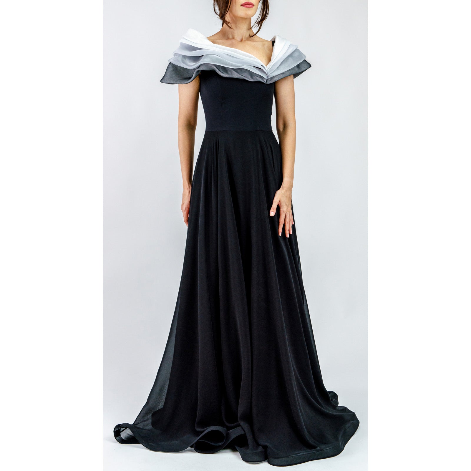 Elegant Dramissa Sculpted Collar Silk Gown with voluminous hand-shaped collar, fitted bodice, and flowing black skirt.