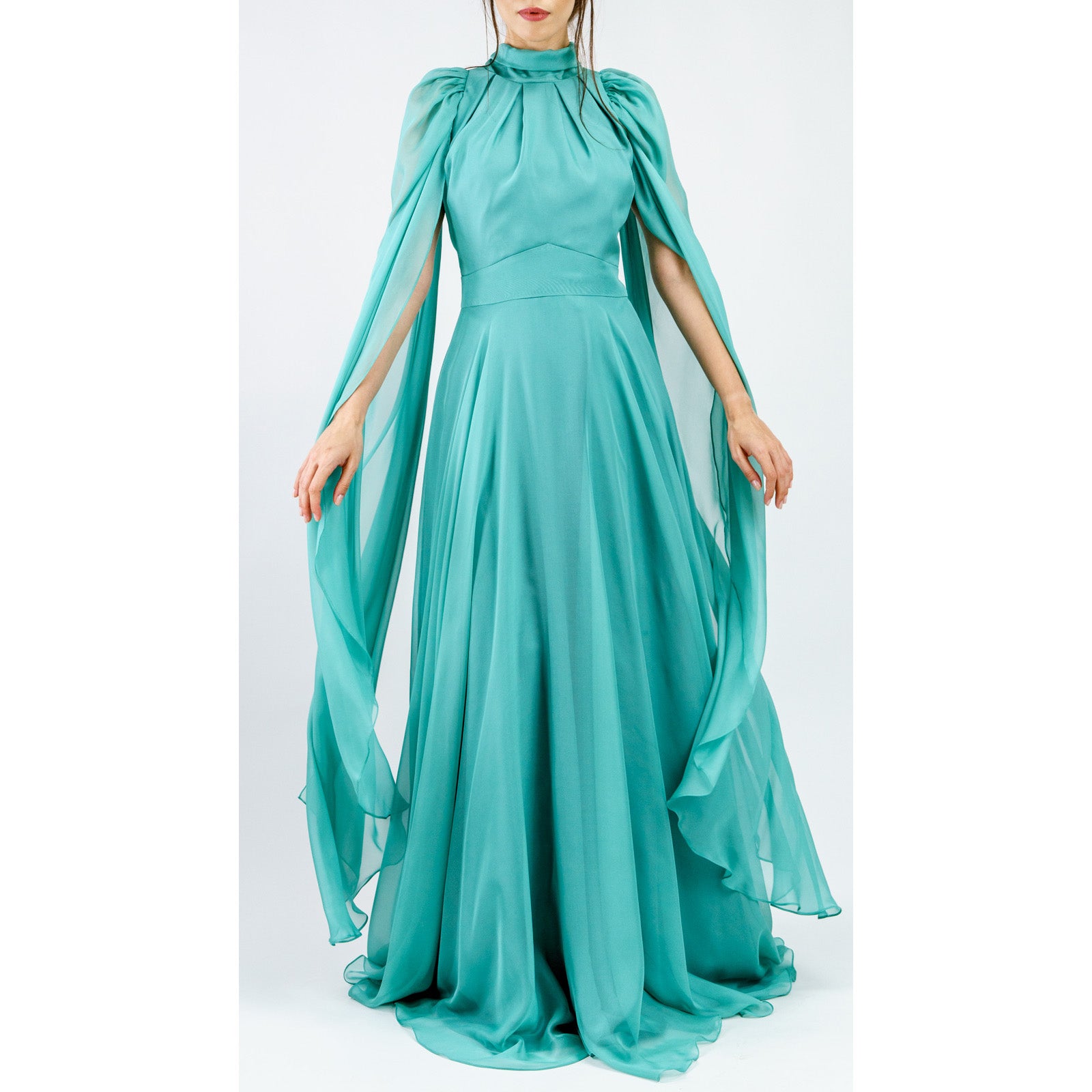 Aurelesse Turquoise Convertible Gown made from Italian satin and chiffon, showcasing a graceful flow and versatile styling options.