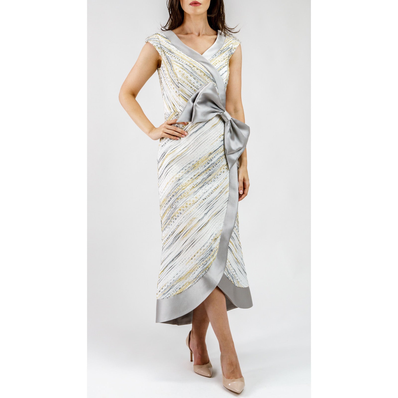Celestienne Metallic Jacquard Cocktail Dress with V-neckline and oversized bow, featuring silver hemline.