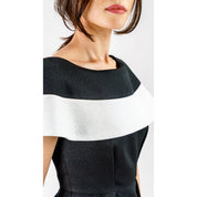 Marcelline contrast-collar midi dress in black and white, featuring a sculpted bodice and modern neckline in shimmering French jacquard.