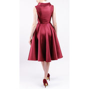 Back view of Leonelle Mikado Asymmetric Collar Dress in pearlescent fabric, showcasing elegant silhouette and retro-inspired flair.