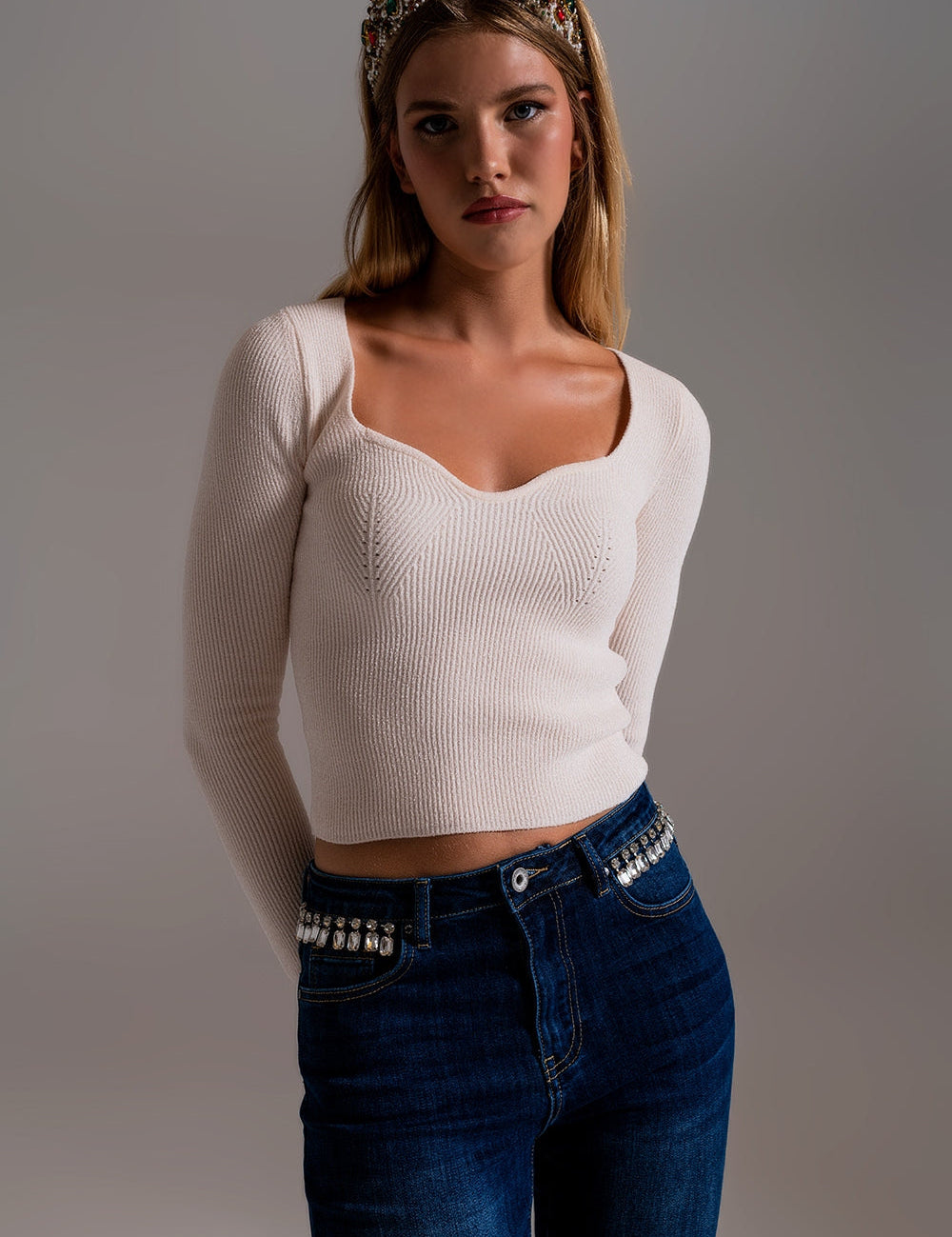 Velesse Chenille Knit Sweater with sweetheart neckline and ribbed texture, worn by model with long sleeves and bodycon fit.