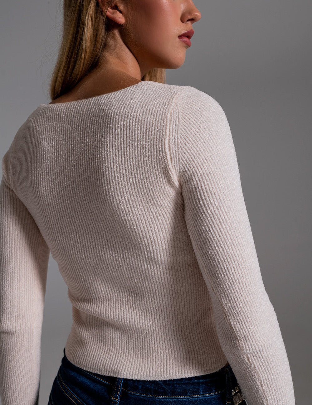 Back view of Velesse Chenille Knit Sweater in cream, featuring ribbed texture and fitted silhouette for a chic, cozy look.