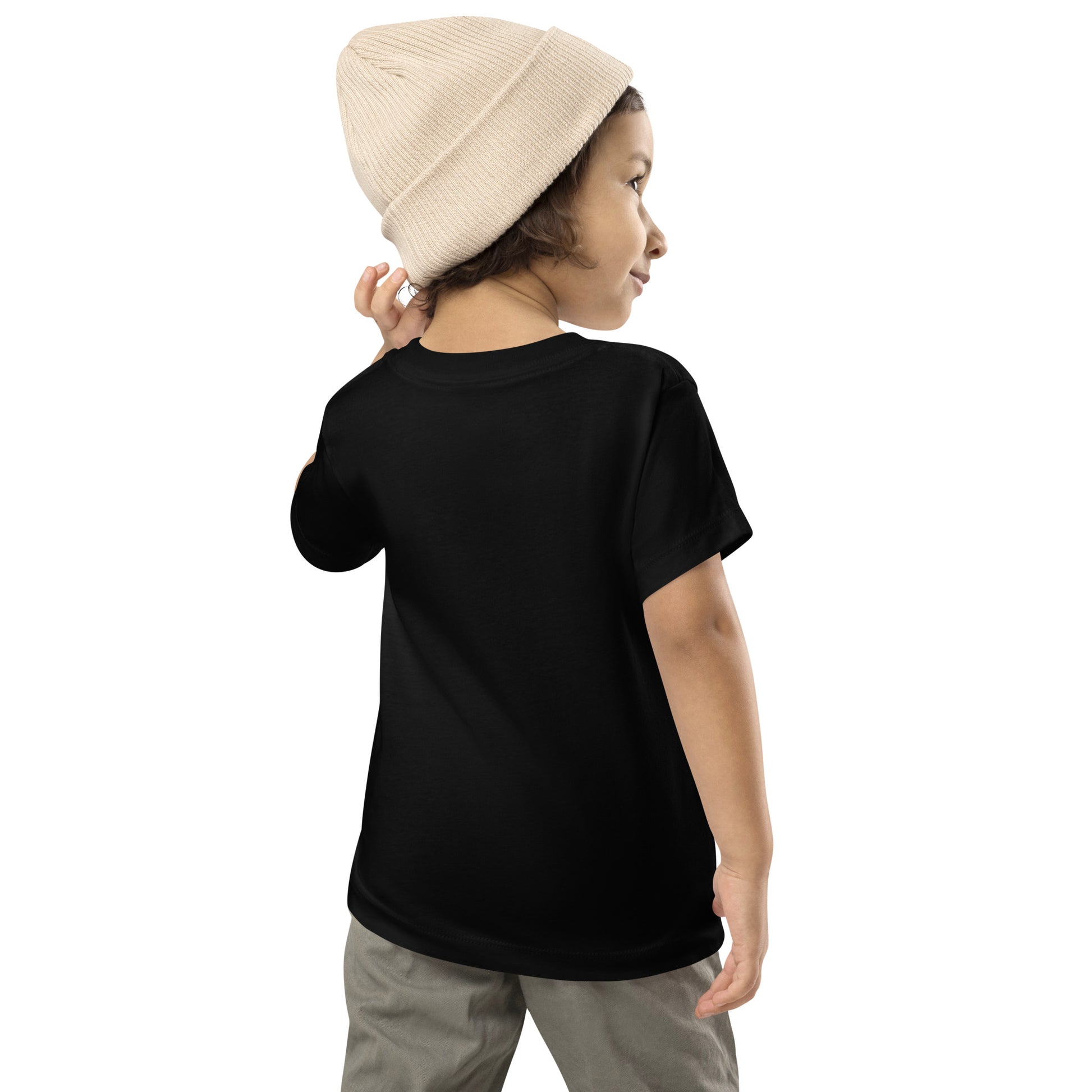 Toddler wearing black short sleeve T-shirt and beige beanie, showcasing Ukraine design, side view, 100% cotton, comfortable and stylish.