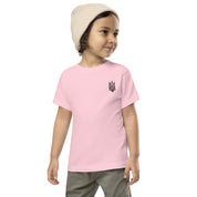 Toddler wearing pink short-sleeve tee with Ukrainian Tryzub print, made from soft cotton for comfort and style.