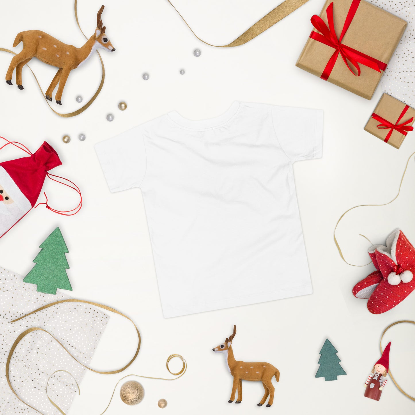 White toddler short sleeve T-shirt with Ukraine design surrounded by festive holiday decorations including gifts and reindeer.