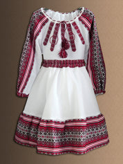 Traditional Ukrainian girl's embroidered blouse and skirt set, folk style, soft cotton blend, red and white Vyshyvanka design.
