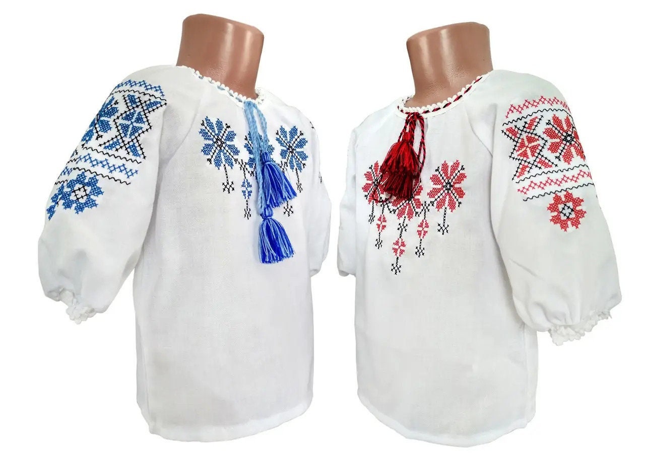 Traditional Ukrainian embroidered blouses for girls with red, black, and blue "Rosava" design, sizes 92-128 cm (ages 2-8).