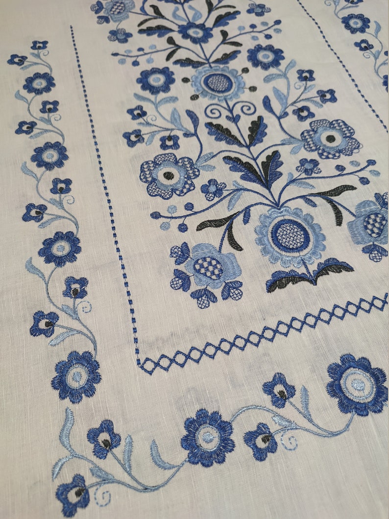 Traditional Ukrainian rushnyk with blue floral embroidery, 100% linen, Tree of Life motif, cultural wedding ceremony cloth.