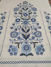 Traditional Ukrainian embroidered rushnyk with blue Tree of Life motif on 100% linen, symbolic of prosperity and protection.