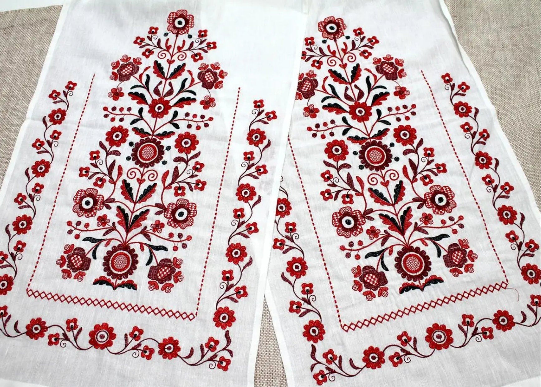 Traditional Ukrainian wedding rushnyk with red Tree of Life embroidery on linen, cultural decor or gift.