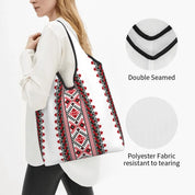 Woman holding a Ukraine Vyshyvanka Embroidery Tote Bag made of tear-resistant polyester with double-seamed design.
