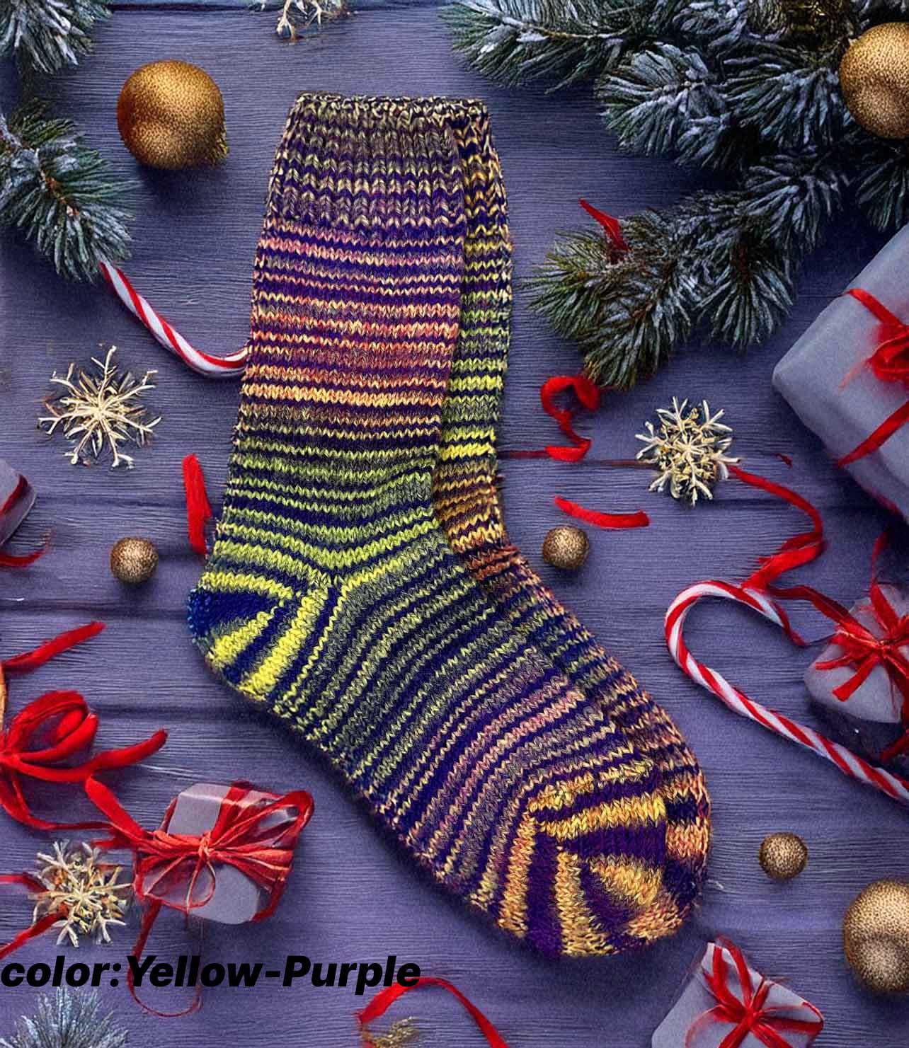 Colorful yellow-purple hand knitted wool sock with Christmas decorations, perfect cozy gift for winter warmth and comfort.