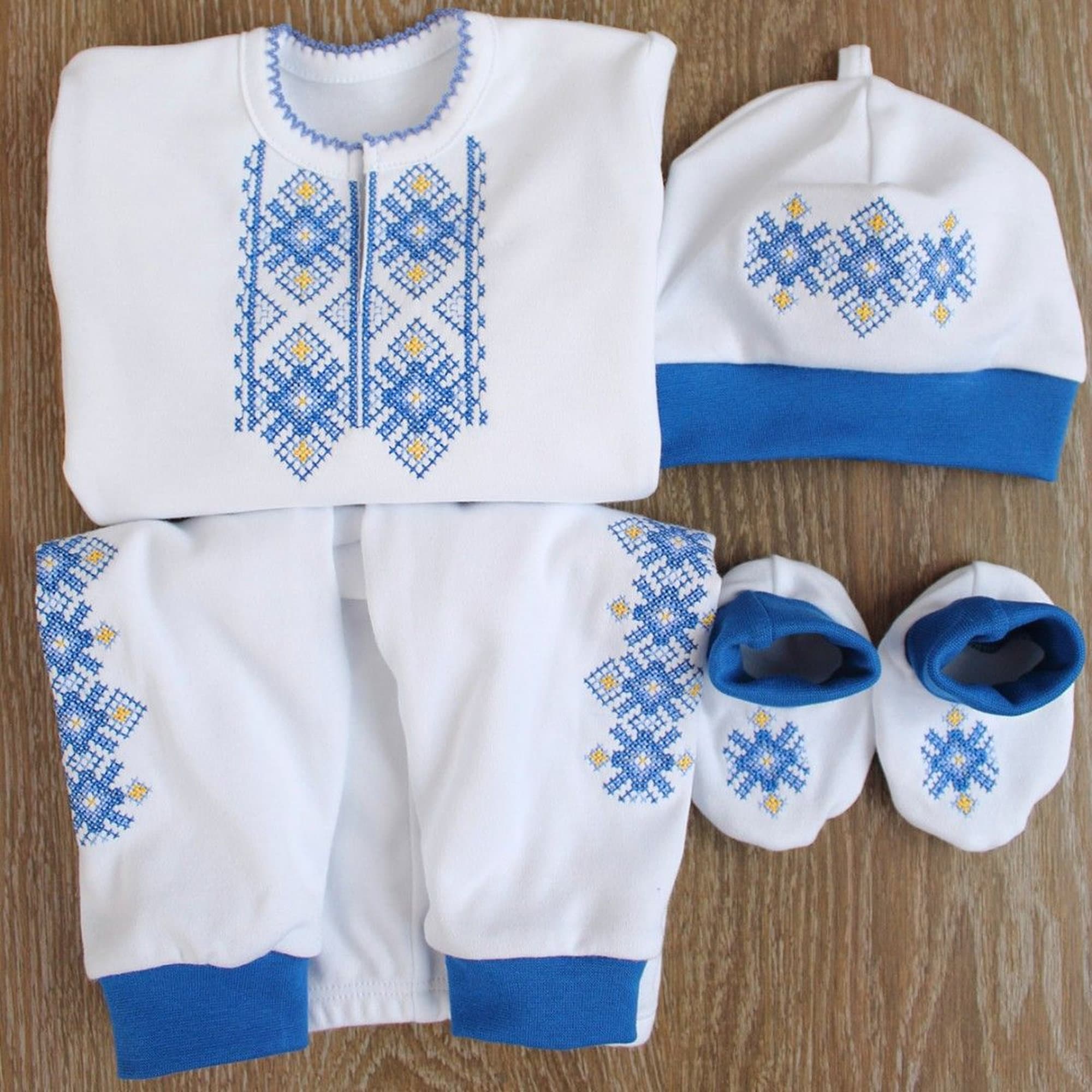 Ukrainian embroidered costume for baby boy with shirt, pants, hat, and socks for ages 0-1 year, showcasing traditional design.