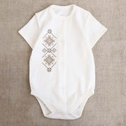 Ukrainian embroidered baby romper with beige-brown Vyshyvanka patterns, perfect for newborns as a coming-home outfit or baby shower gift.