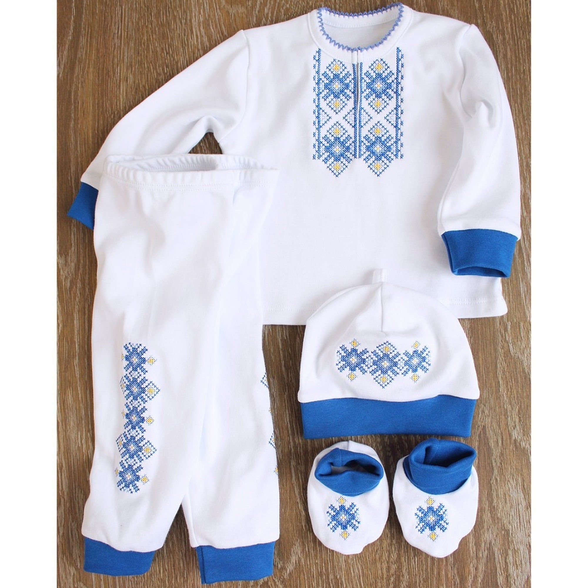 Ukrainian embroidered baby boy costume set with shirt, pants, hat, and socks for ages 0-12 months, showcasing cultural heritage.