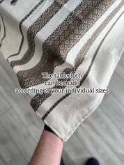 Ukrainian embroidered linen tablecloth held up to show ethnic pattern and custom sizing options