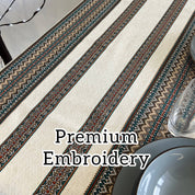 Ukrainian embroidered linen tablecloth with ethnic patterns, showcasing premium quality and natural fabric for dining decor.