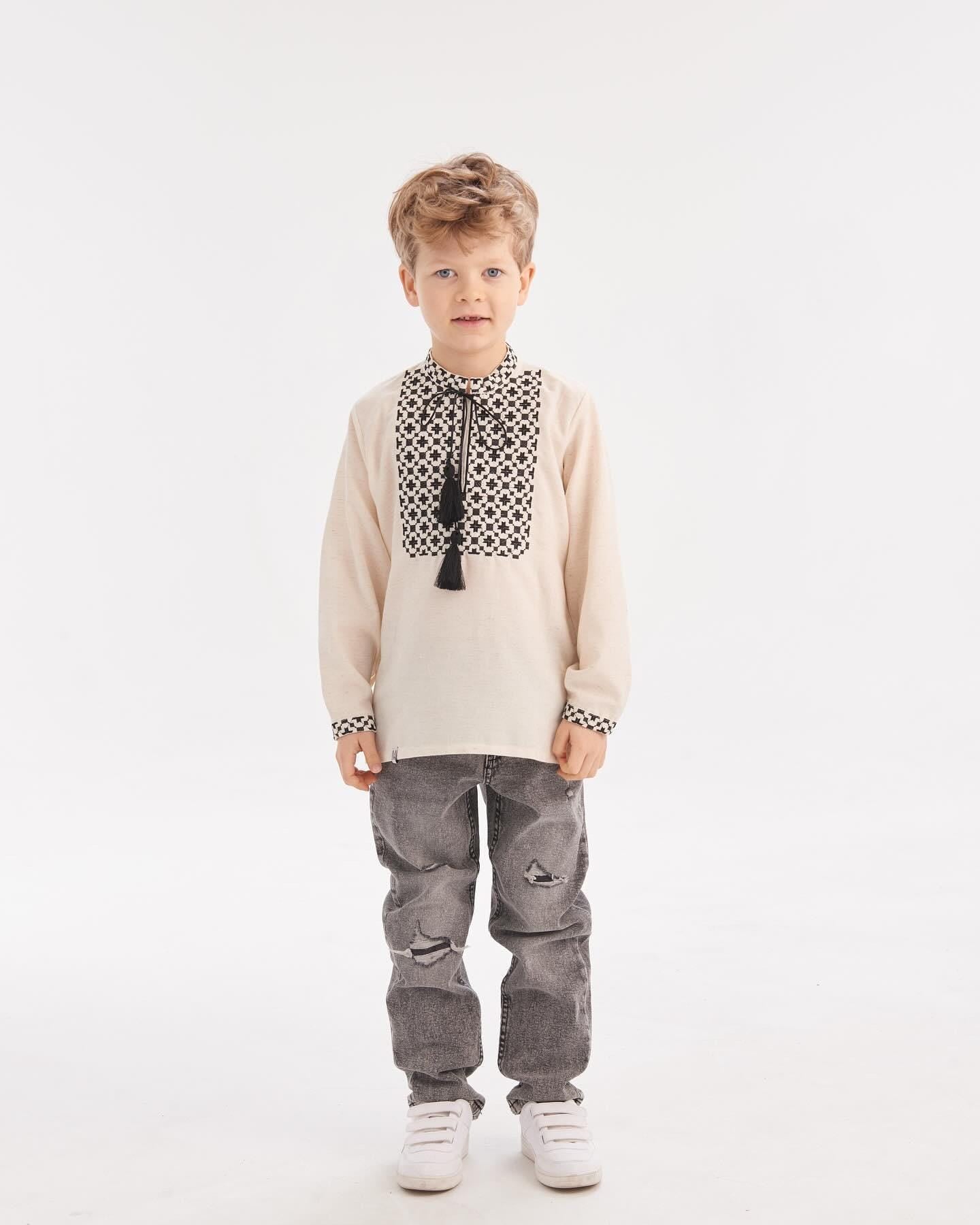 Boys Ukrainian embroidered shirt in traditional Slavic folk style, featuring intricate patterns and soft, comfortable fabric.