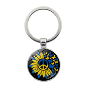 Ukrainian Glass Keychain with Peace Sign and Sunflower Emblem in Blue and Yellow