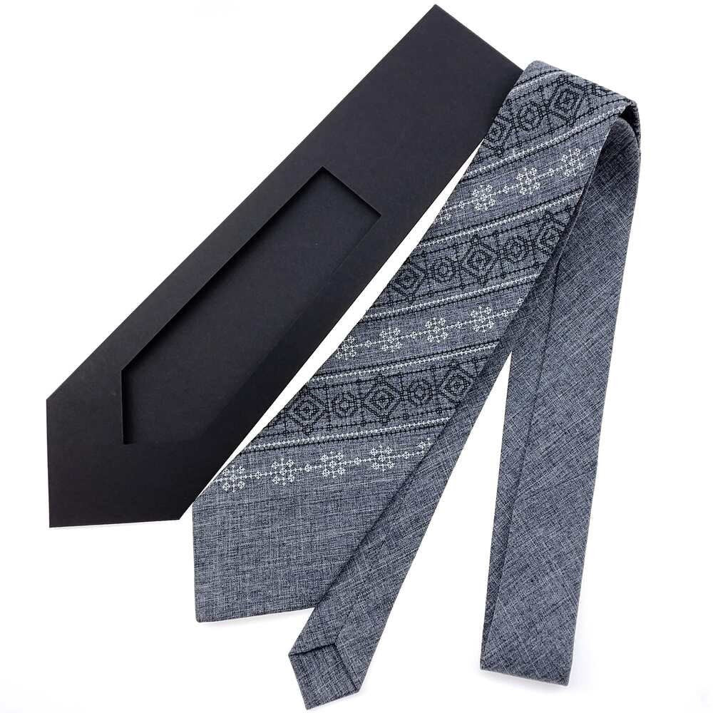 Ukrainian gray embroidered men's tie with folk motifs, presented in black gift box, perfect for formal and festive occasions.