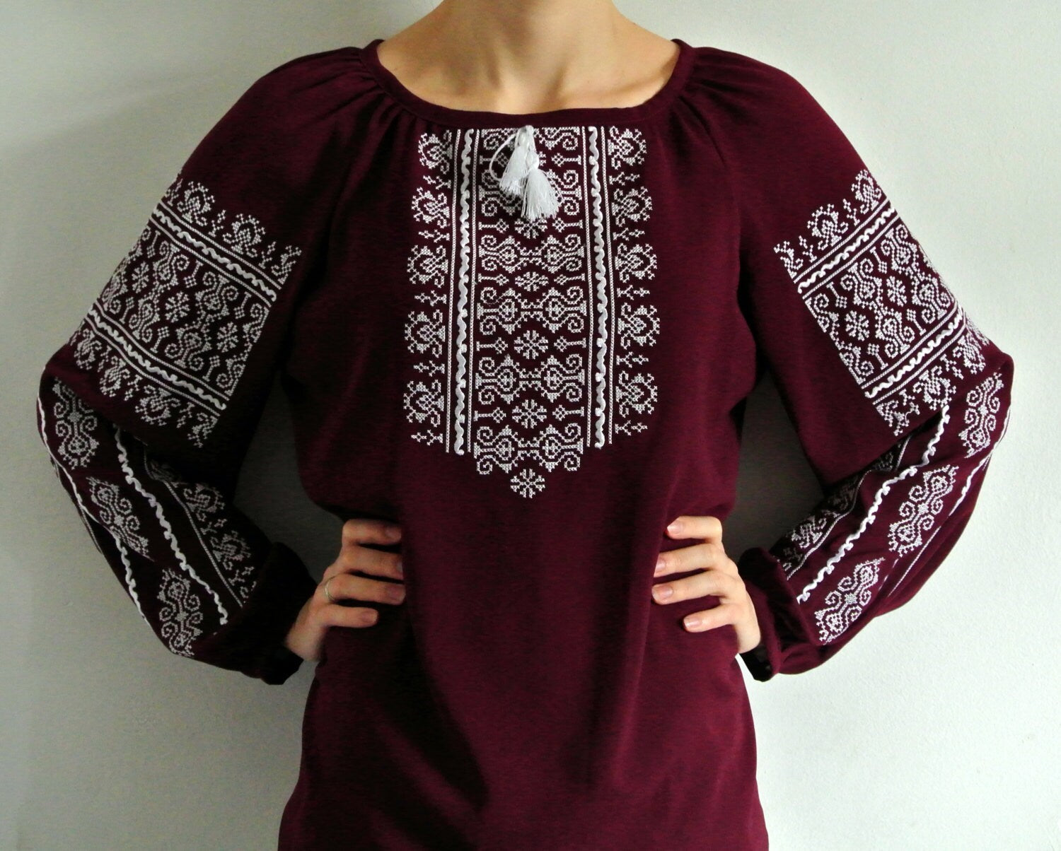Marsala boho Vyshyvanka blouse with white geometric embroidery, showcasing classic Ukrainian peasant shirt style.