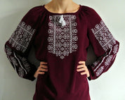 Marsala boho Vyshyvanka blouse with white geometric embroidery, showcasing classic Ukrainian peasant shirt style.