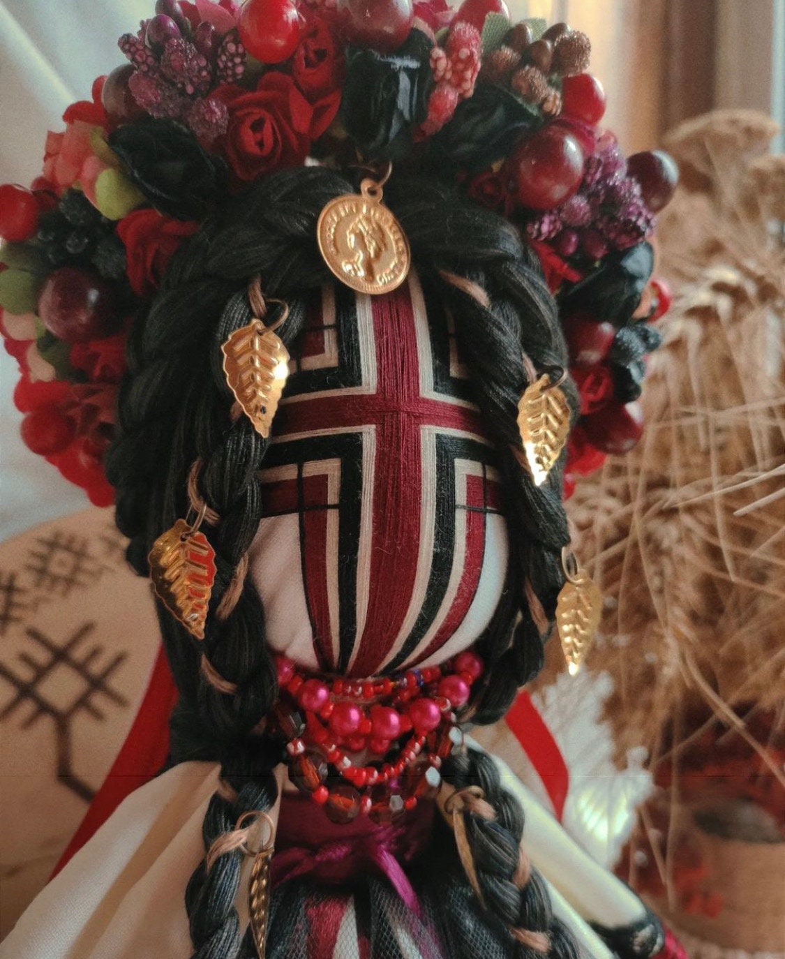 Traditional Ukrainian Motanka Doll with colorful headdress and decorations, symbolizing Slavic folklore and cultural heritage.