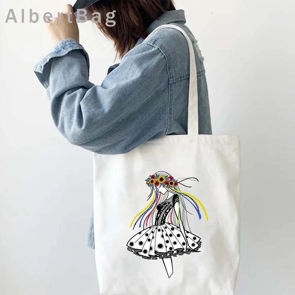 Ukrainian Patriotic Grocery Tote Bag with colorful traditional design on a woman's shoulder