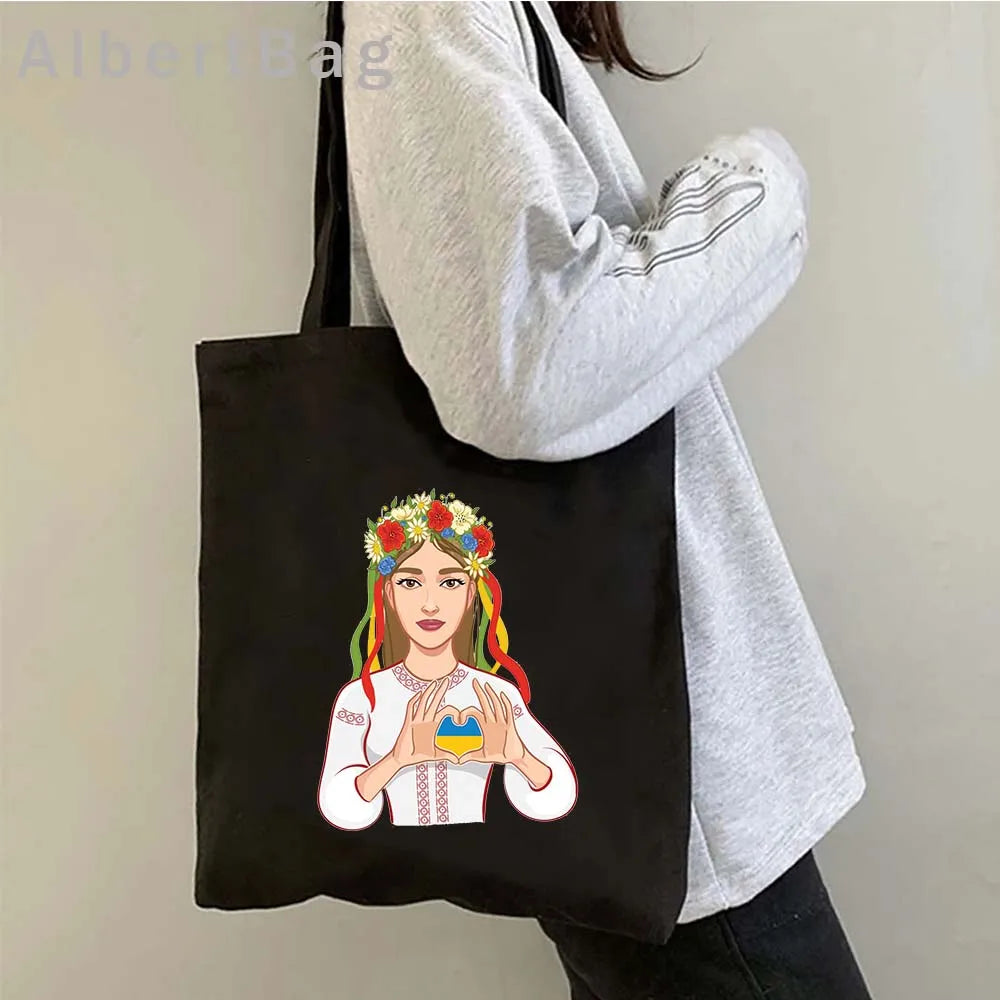 Ukrainian Patriotic Grocery Tote Bag with traditional woman design, eco-friendly reusable cotton for shopping.