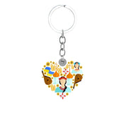 Heart-shaped keychain with colorful Ukrainian folk art design, featuring cultural motifs and symbols, attached to a metal chain.