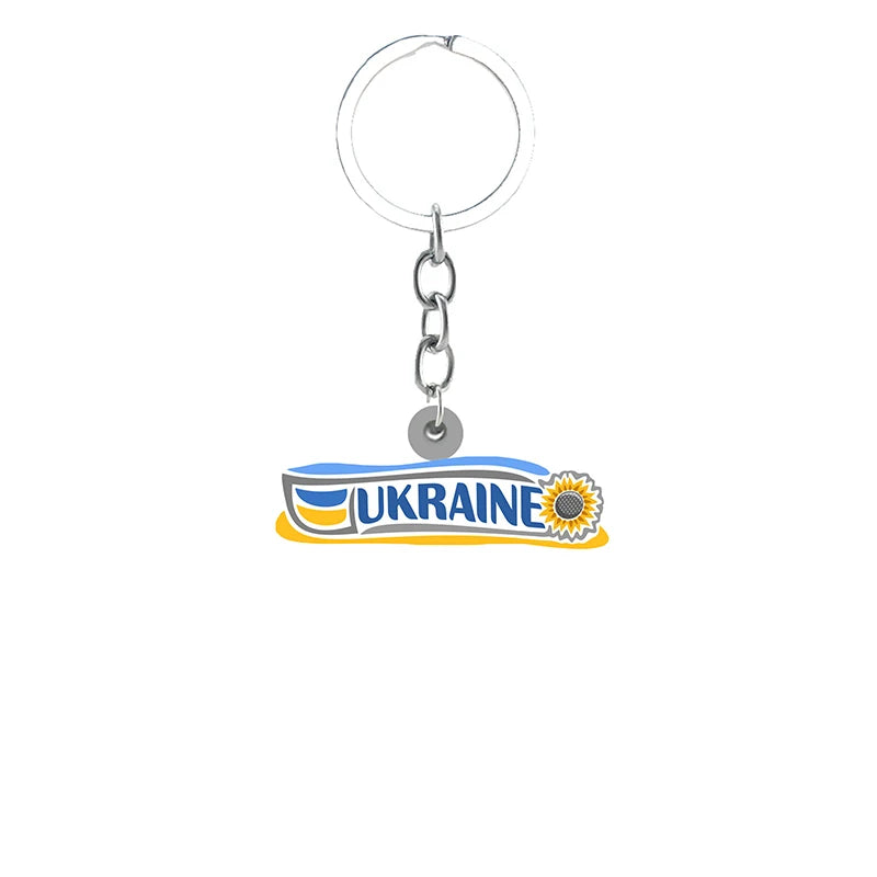 Ukrainian Symbols Pendant Keychain with Trident design and sunflower accent, symbolizing pride and unity.