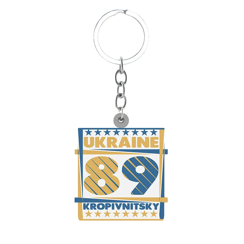 Ukraine 89 Kropyvnytsky keychain with bold blue and yellow design featuring stars, symbolizing Ukrainian pride and heritage.