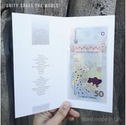 Limited edition 50 UAH Ukraine commemorative banknote in souvenir booklet, "Unity Saves the World" theme.