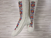 Folklore knitted wool socks with vibrant embroidery, perfect cozy gift for men and women.