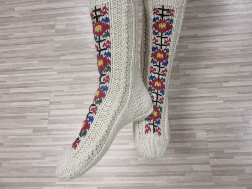 Folklore knitted wool socks with vibrant embroidery, perfect cozy gift for men and women.